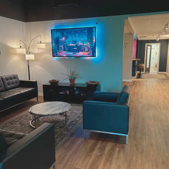 The Lobi Space lobby lounge with seating and natural light in Pilsen, Chicago