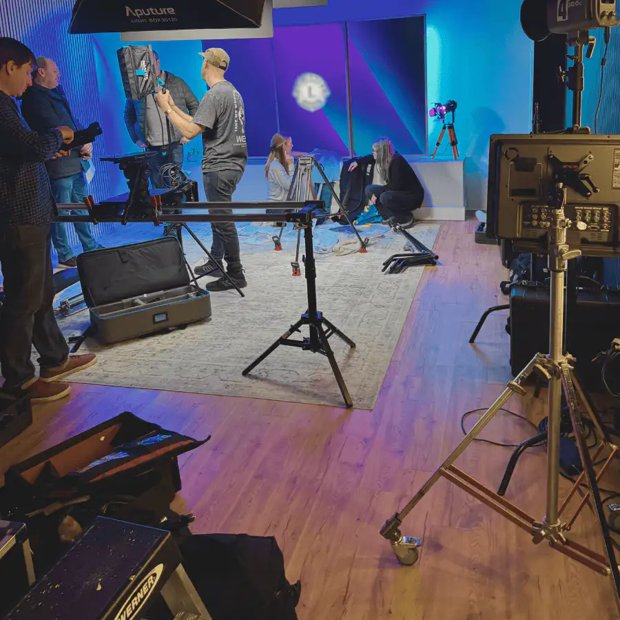 Video crew and studio lighting set up in the Lobi Space podcast room in Chicago