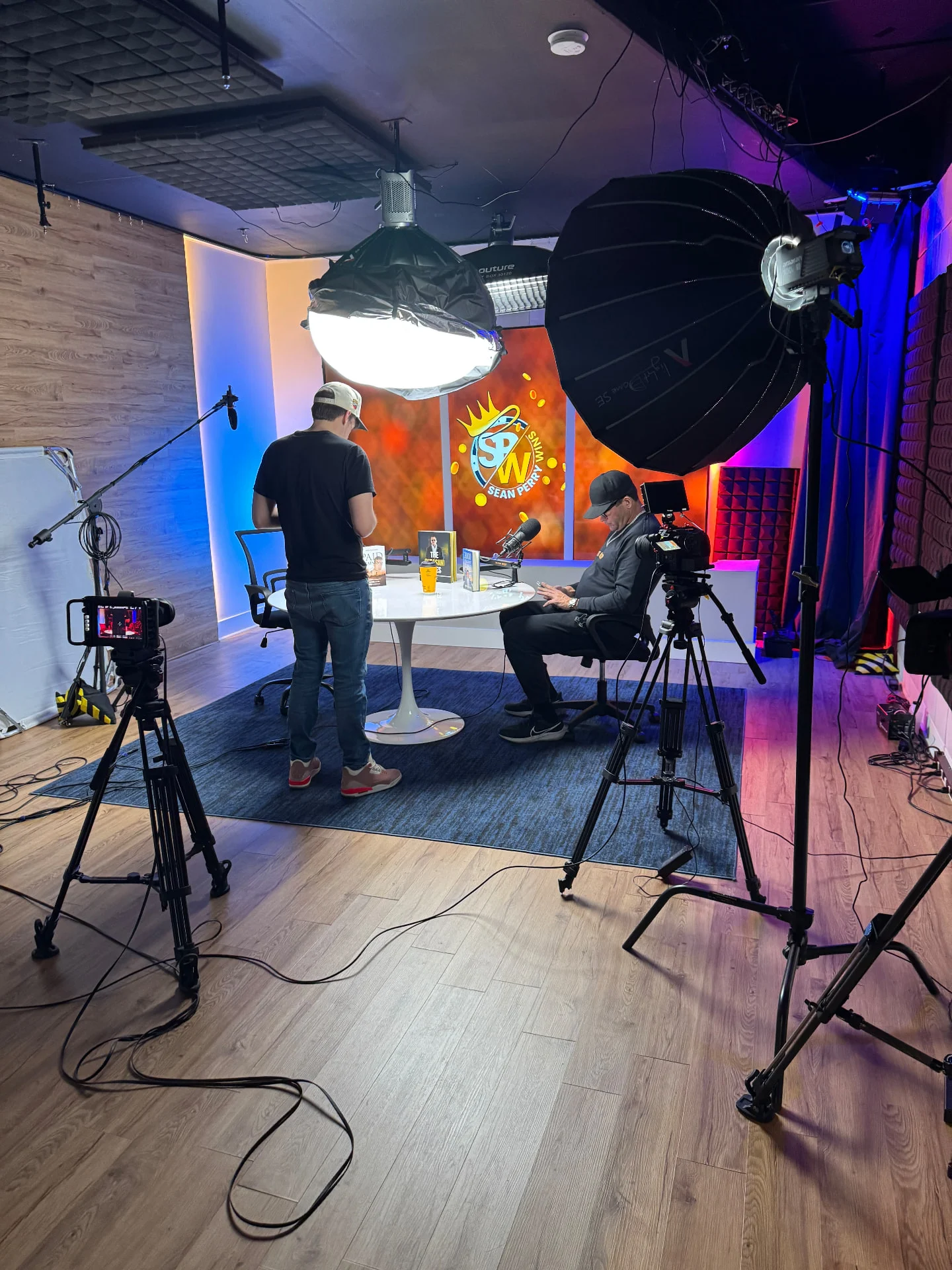 Crew setting up a talk show taping with studio lights and cameras at Lobi Space Chicago